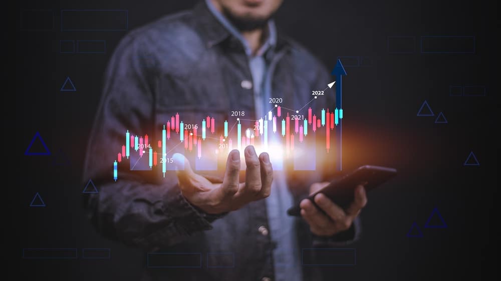 Businessman,Using,Smartphone,Or,Tablet,Trading,Online,In,Bitcoin,Forex